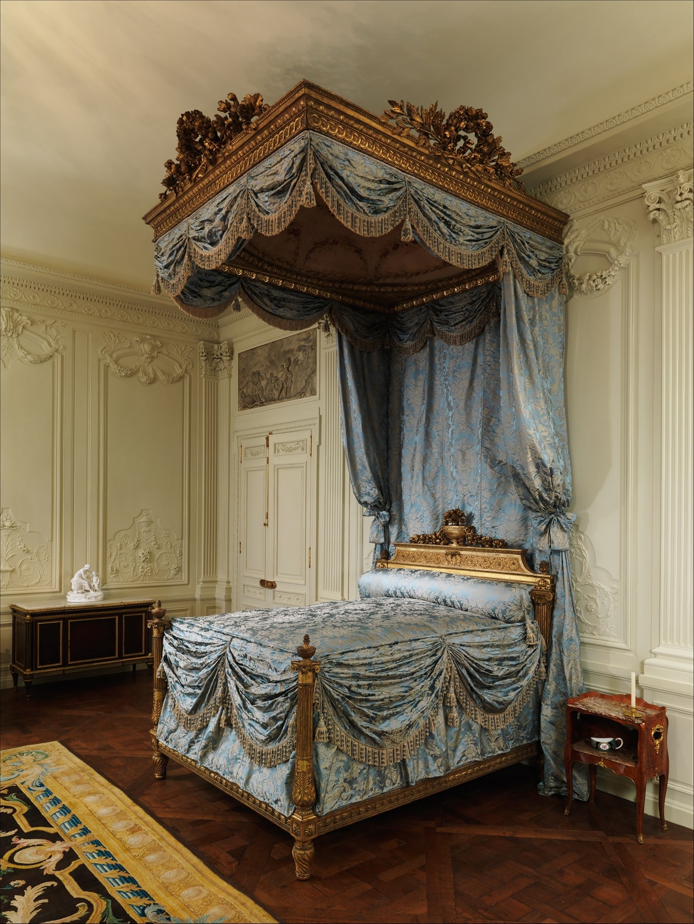Jacob’s tester bed in a museum installation, with its domed canopy suspended above the open-sided frame.