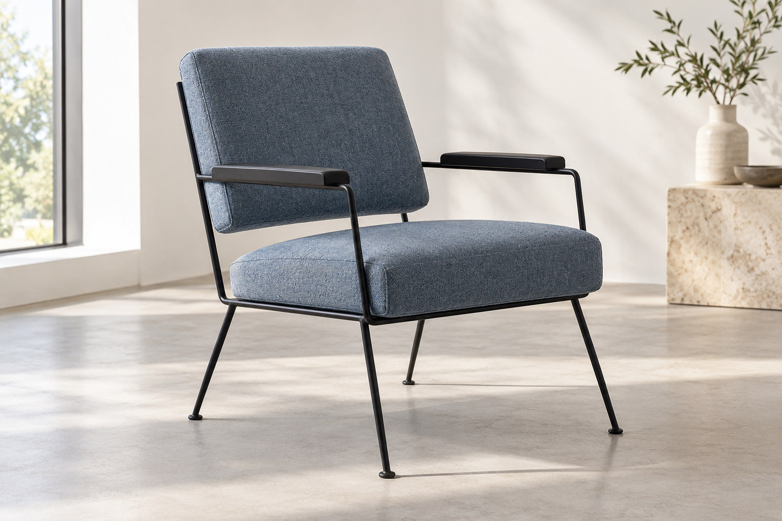 Separate blue-grey upholstered seat and back panels sit within a slender dark four-leg armchair frame.