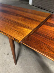 Rosewood dining table designed by Arne Vodder