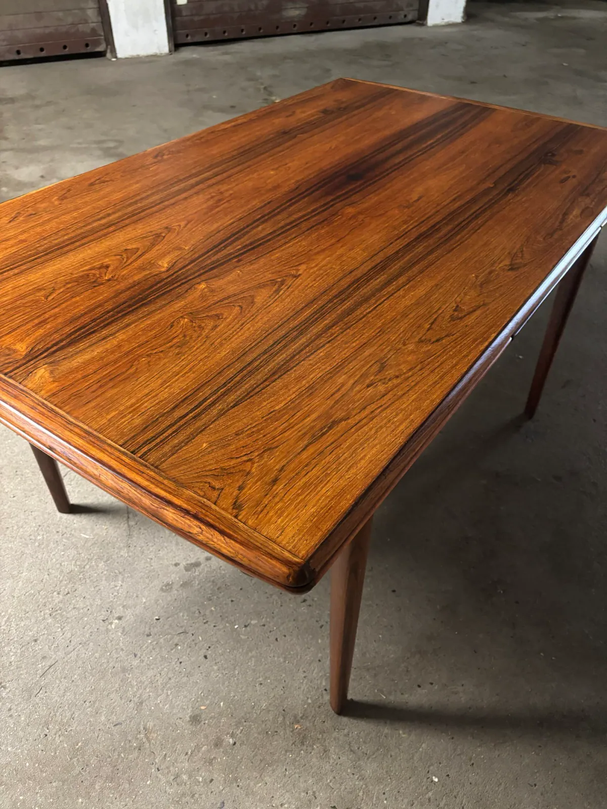 Rosewood dining table designed by Arne Vodder